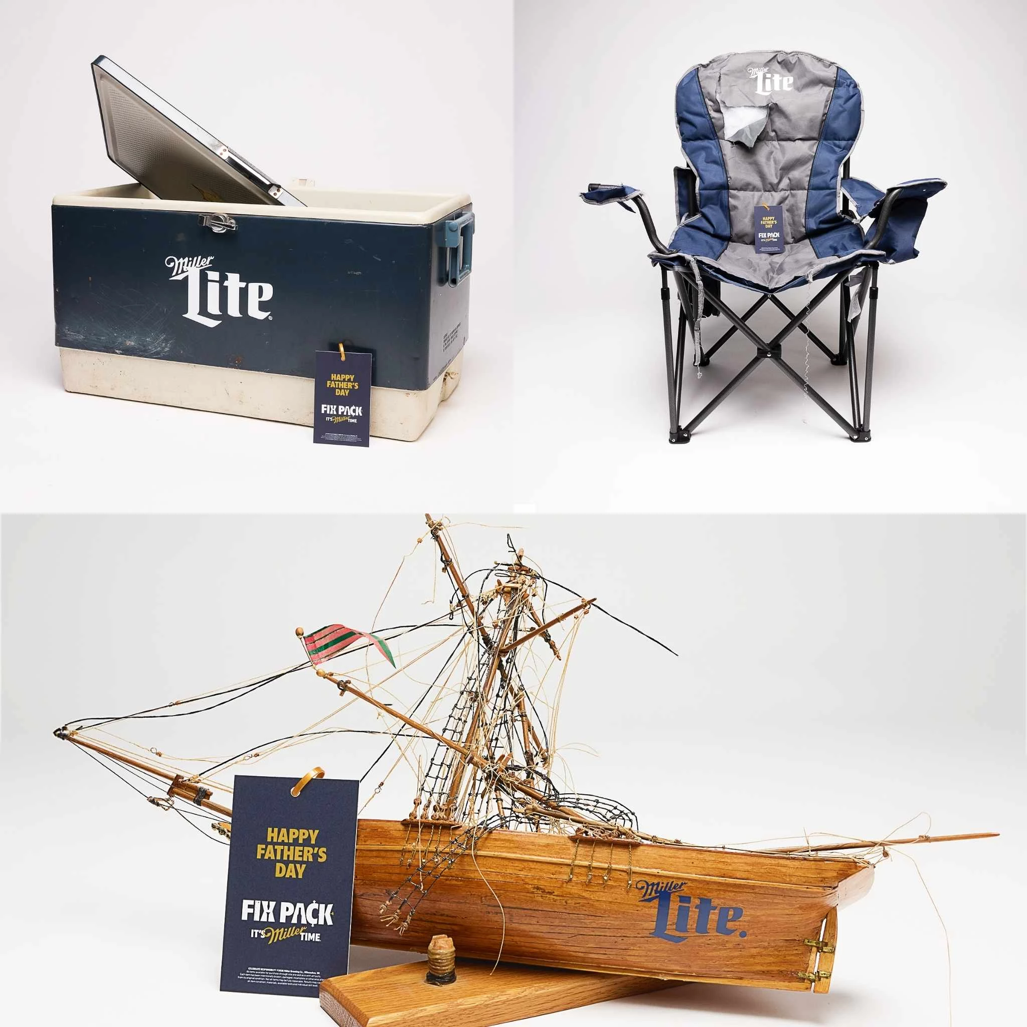 A broken cooler box, camping chair, and model ship.