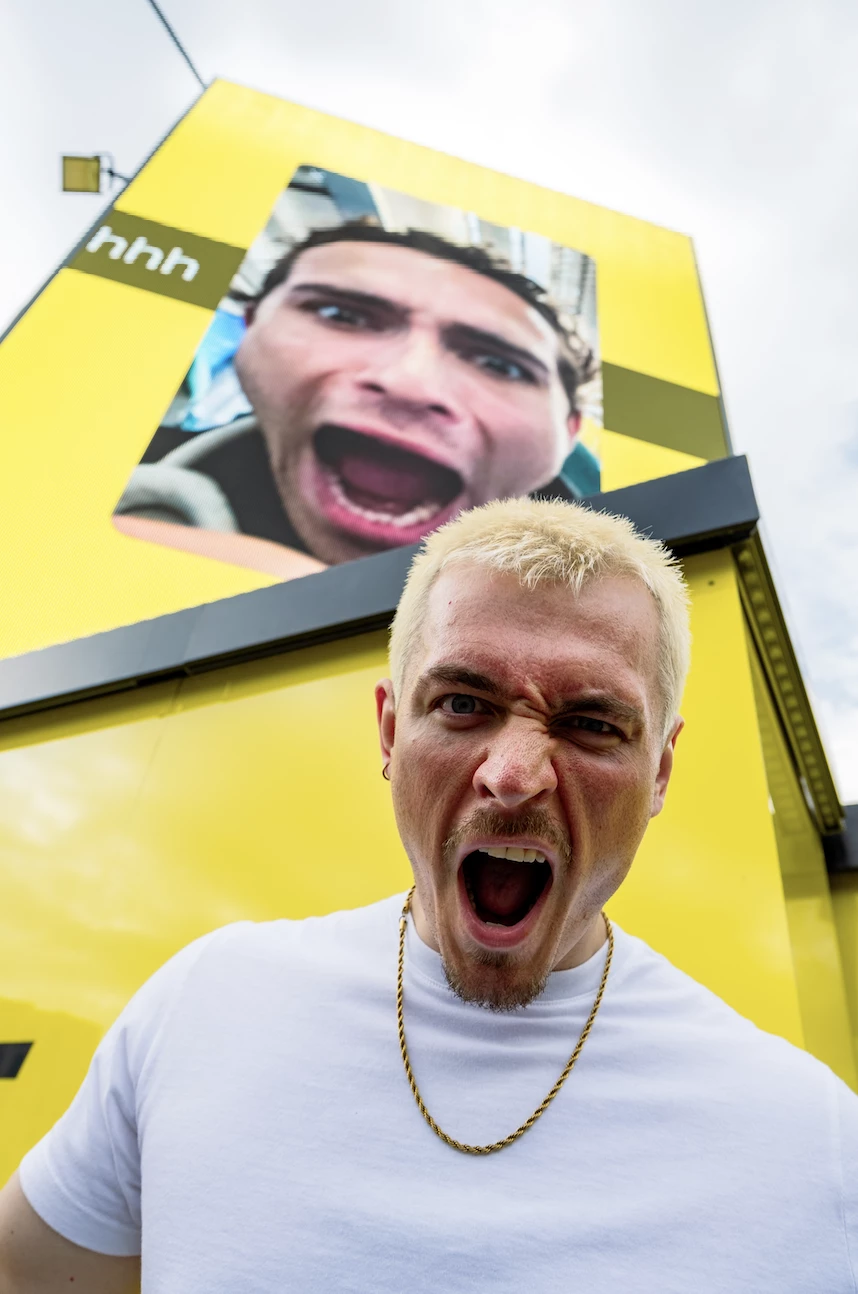 A football fan in front of Snap's OOH digital billboard | Source: Snap A football fan in front of Snap's OOH digital billboard | Source: Snap