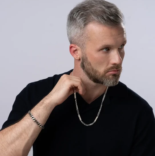 Theo Grace's Father's Day Jewelry 2026 A man wearing a customised leather bracelet from Theo Grace's Father's Day product lineup