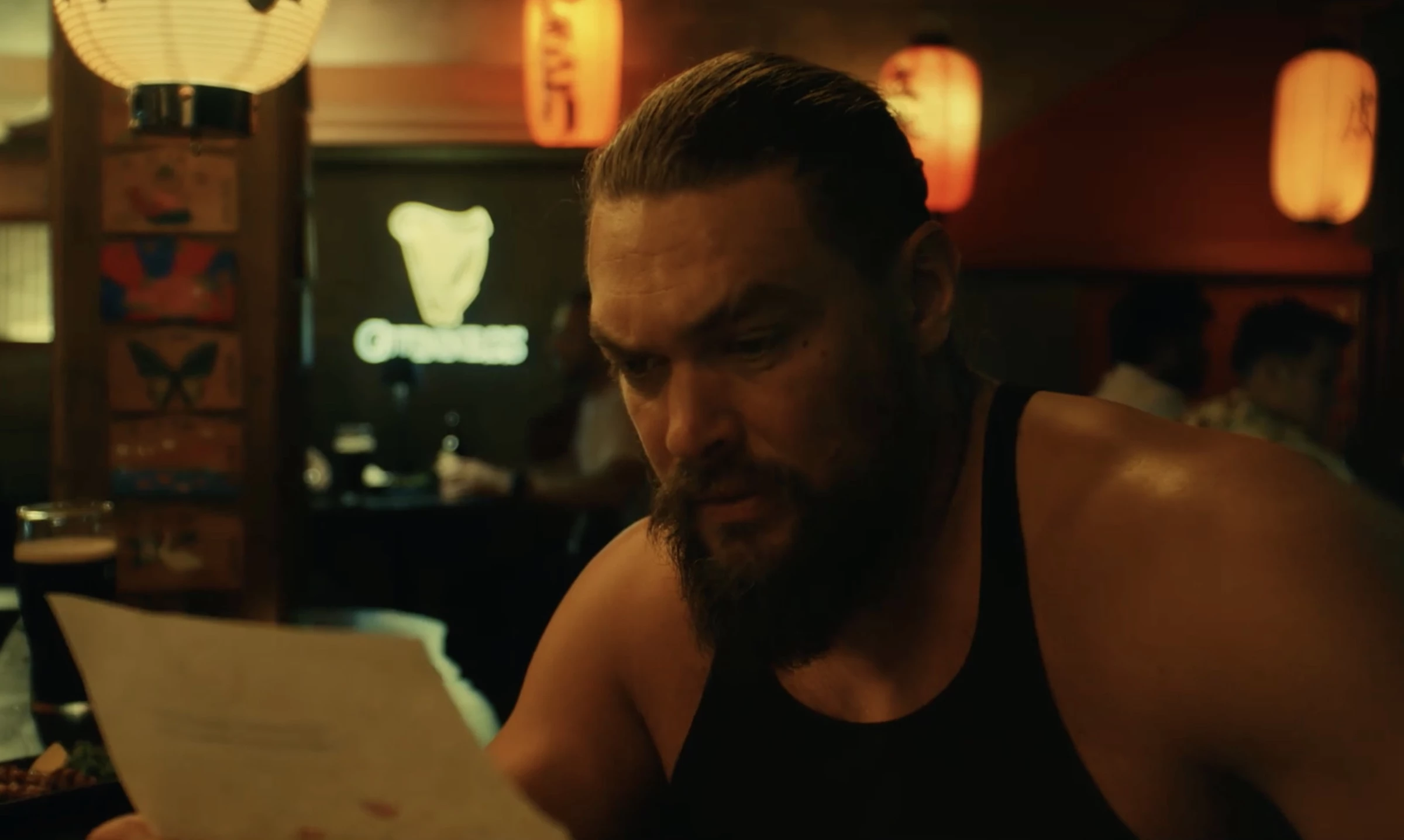 Jason Momoa nervously reads his DNA test results.