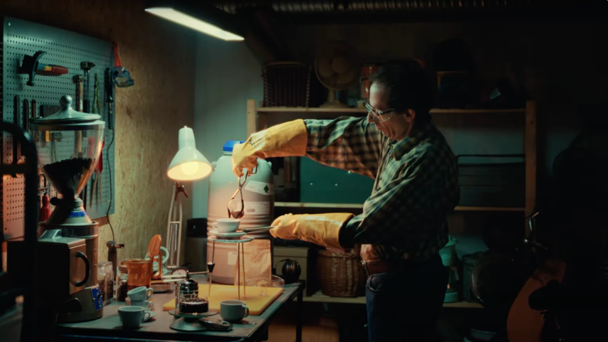 Still taken from the Philips 'join the new coffee movement' campaign video of man making nitro coffee in basement