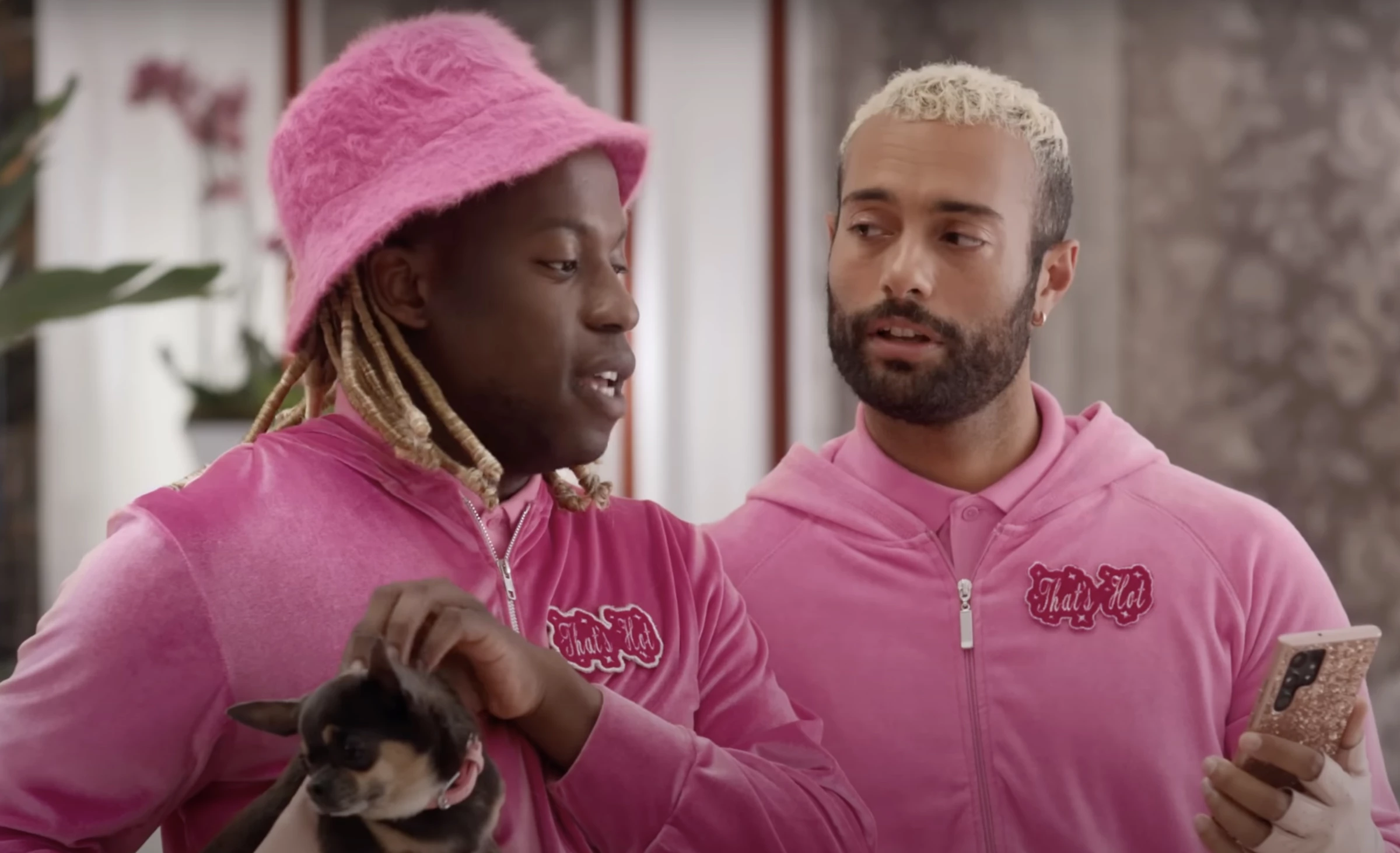 A gay couple is featured in the "Celebrity Treatment" spot of Hilton Honors.