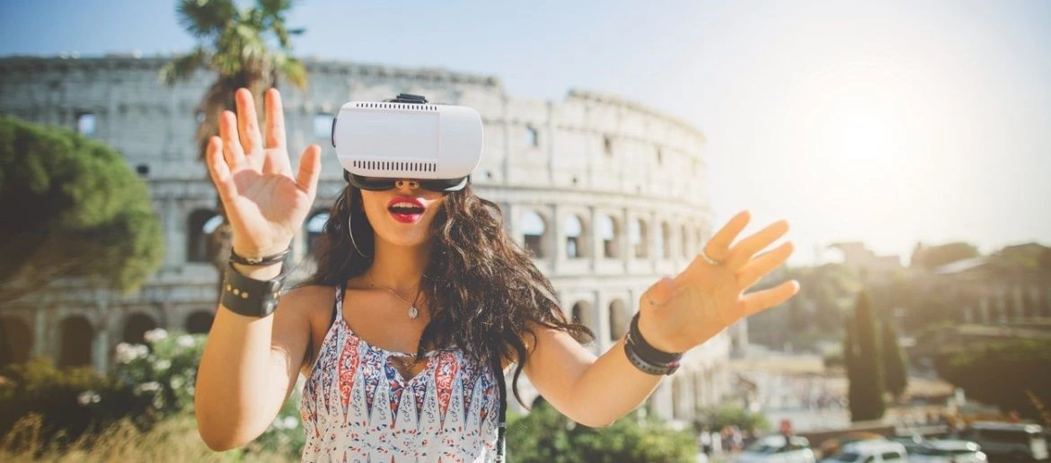 Woman taking VR tour, one of the many benefits of VR in business