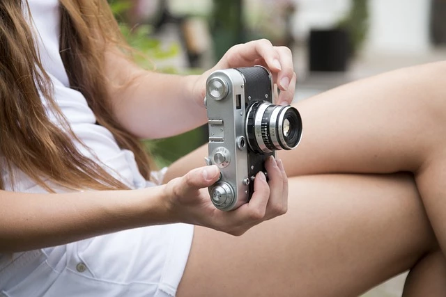 Woman taking a photo Woman taking a photo