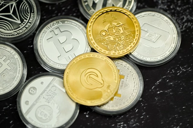Two QEST coins and others Two QEST coins and others