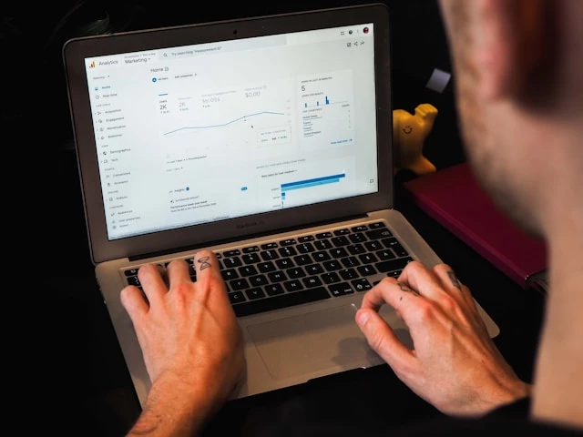Person using analytics for internal linking, a top SEO for Shopify tip
