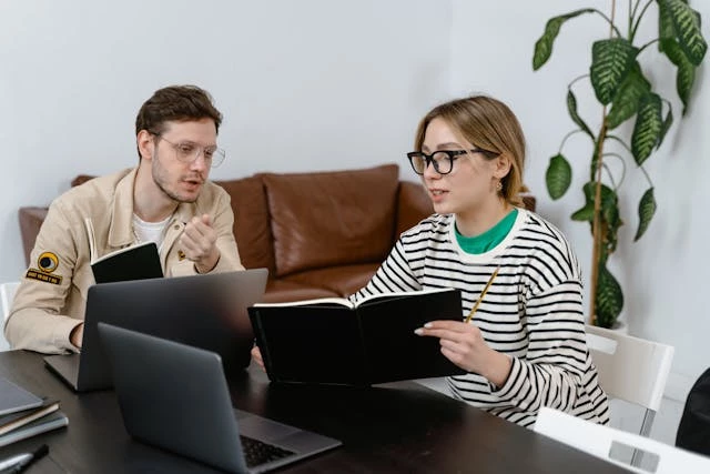Woman discussing with man Woman discussing with man