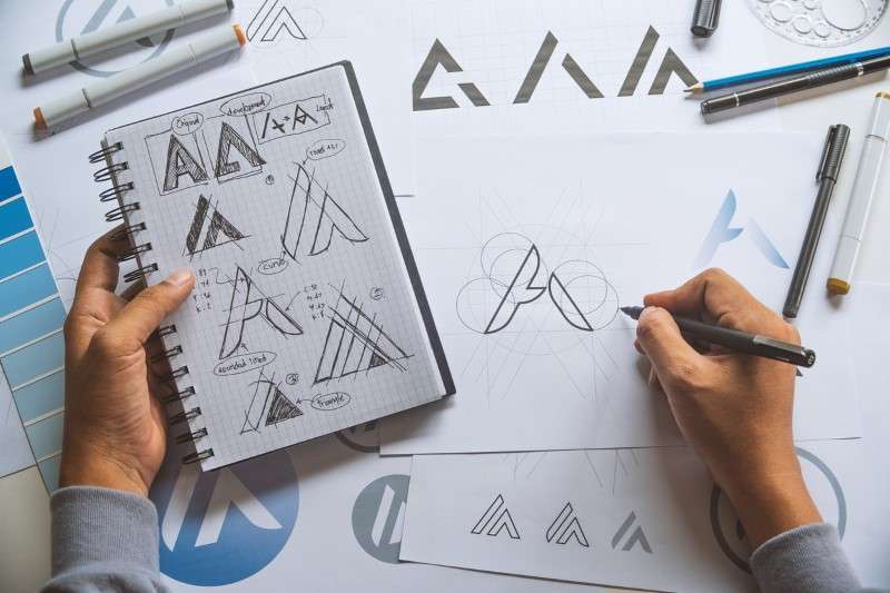 Logo designer creating a logo