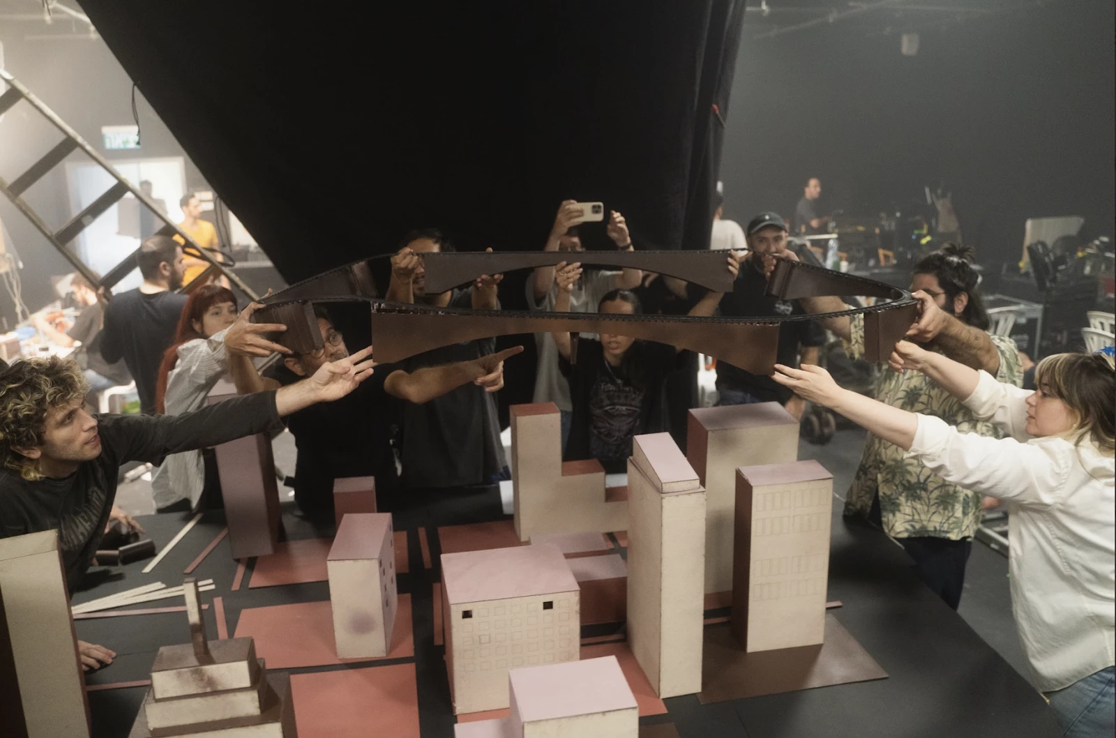 Artists and staff members are hard at work on the set of Fiverr's "Retail Graveyard."