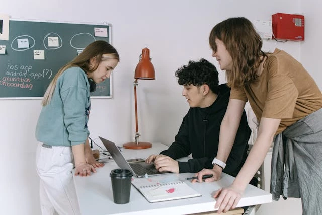 app-developers-looking-at-laptop App developers looking at laptop