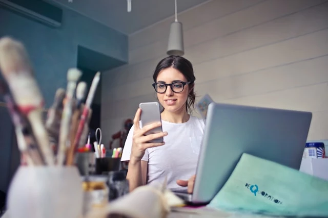 Woman holding a mobile phone