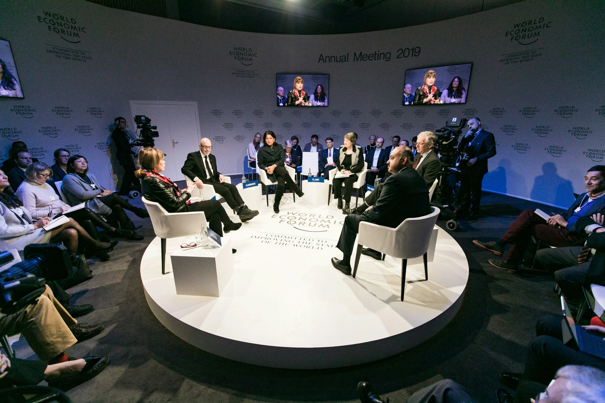 Leaders are interviewed in a newsroom