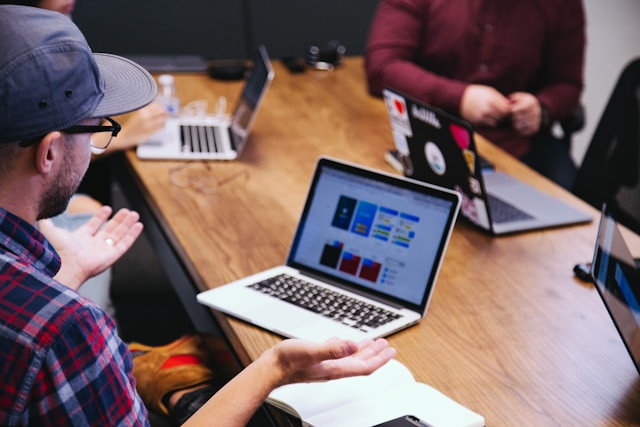 Man talking with laptop