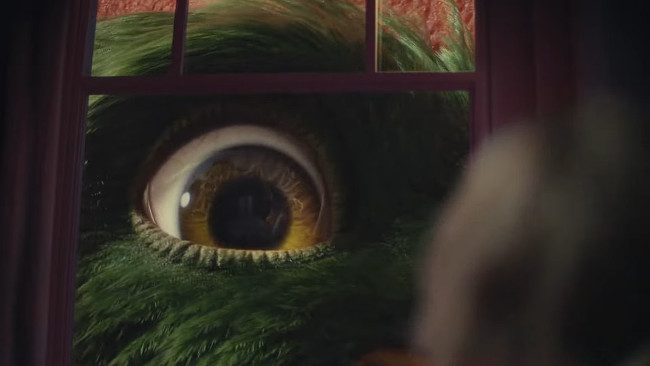 Cornelius peeks into a window