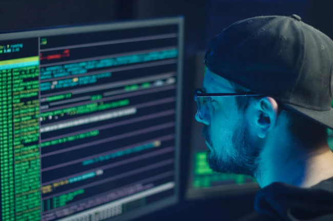Man looking at monitor