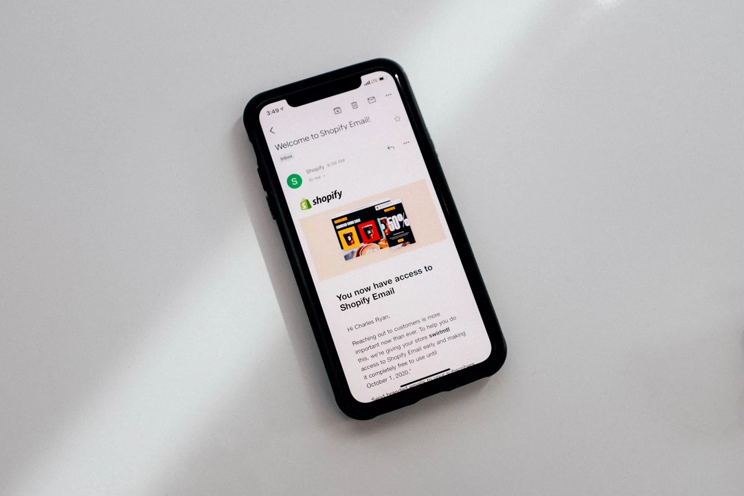 Phone with Shopify on display