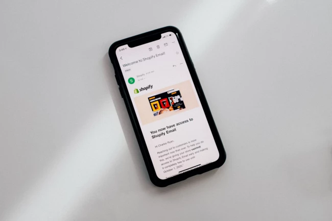 Phone with Shopify on display