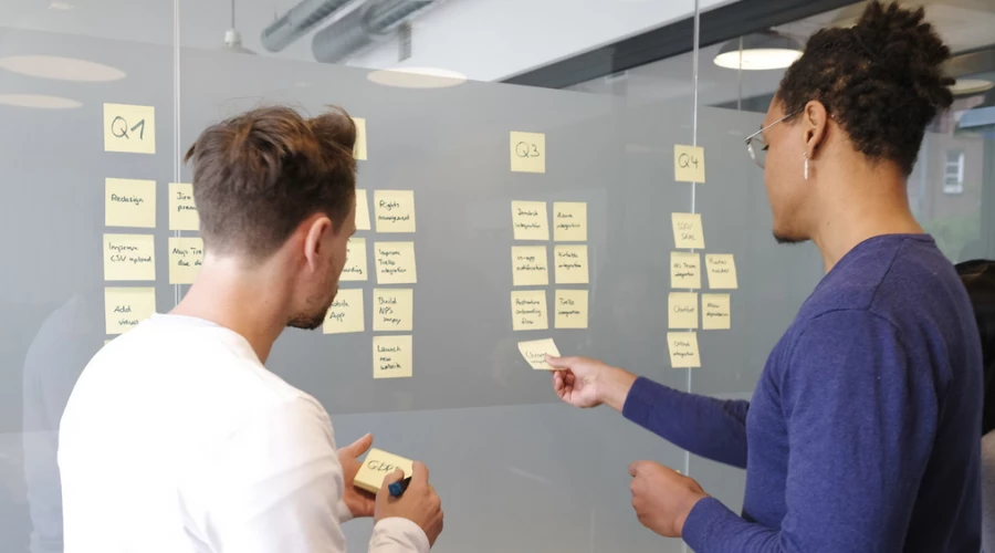 Two persons discussing a roadmap