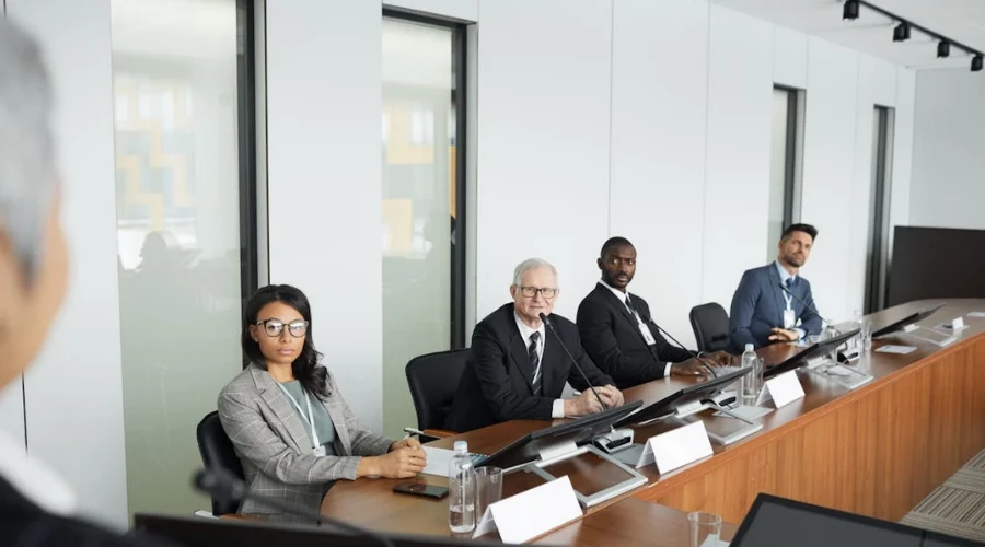 People sitting in conference room