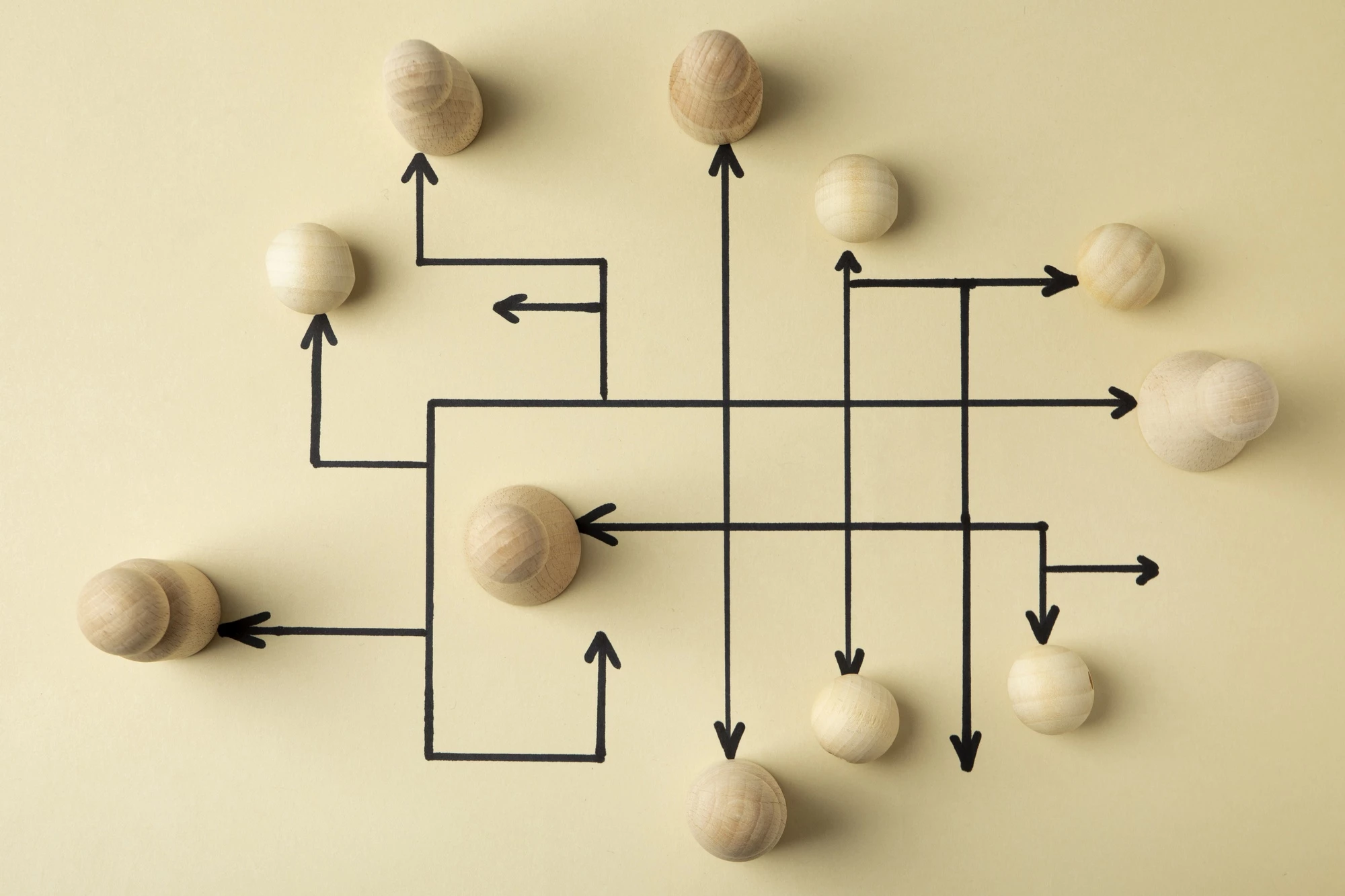 Overlay of wooden pawns arranged like a sitemap
