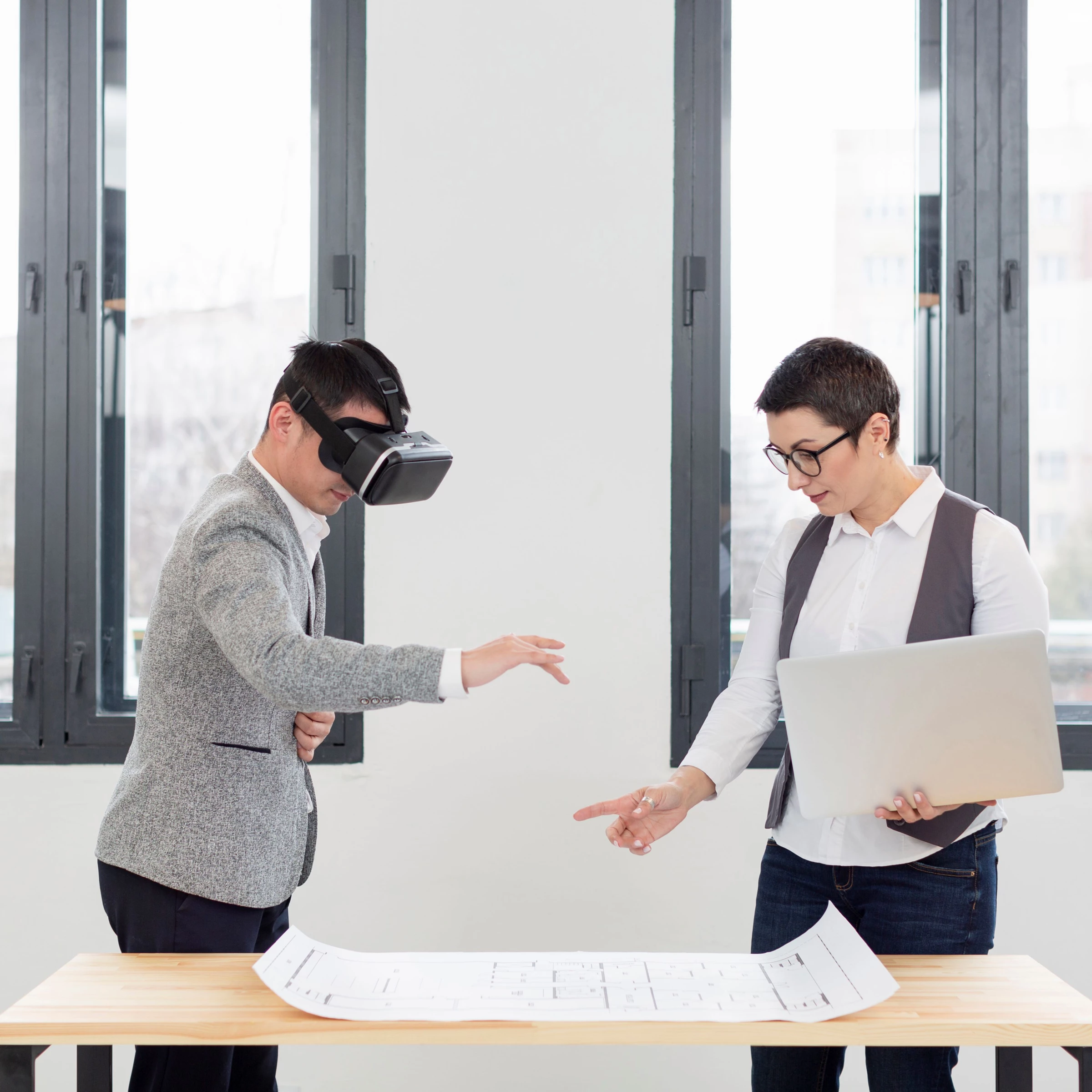 A designer reviews his work using AR-VR technology.