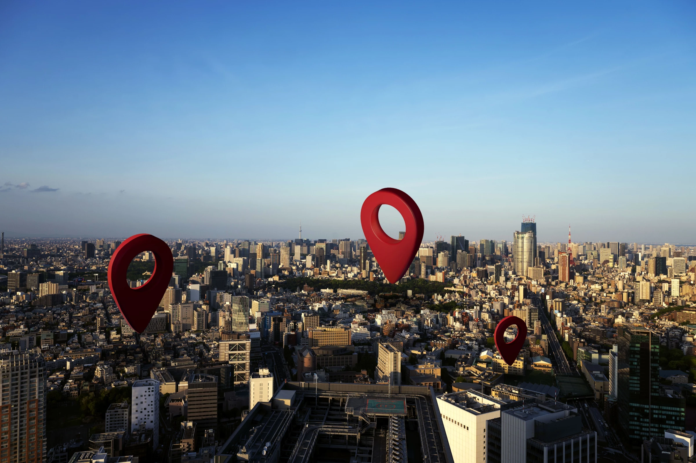 Cityscape with three location symbols representing geotargeting