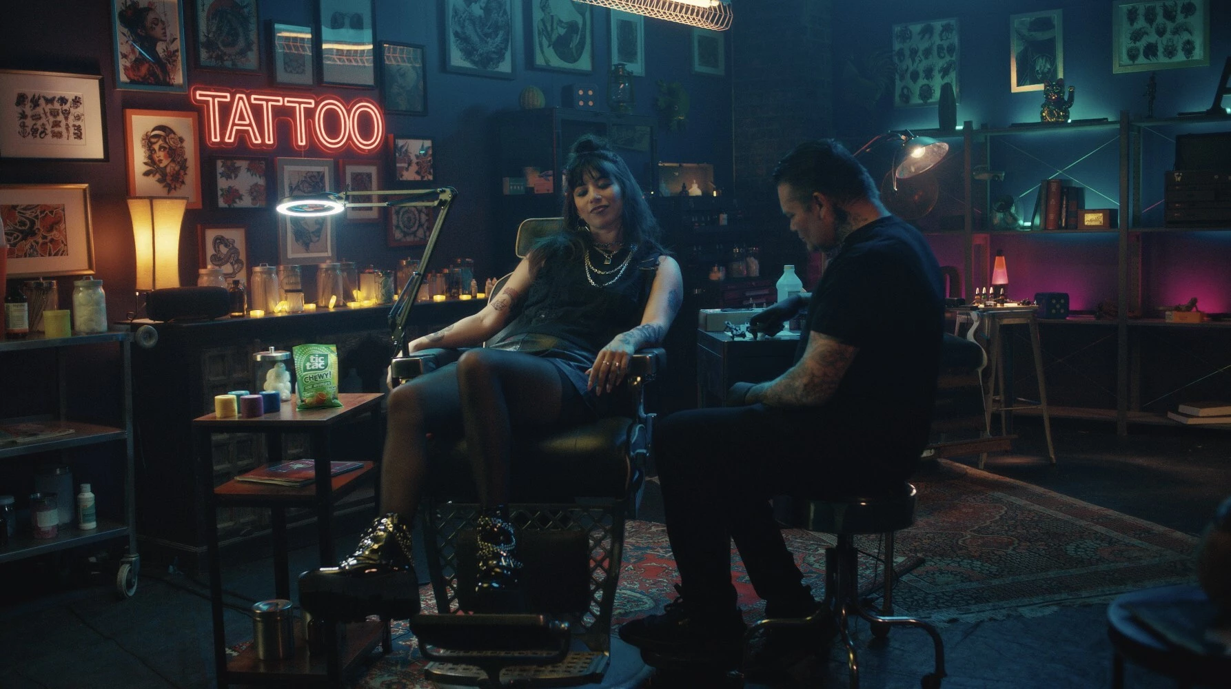 A tattoo artist enjoys Tic Tac Chewy!
