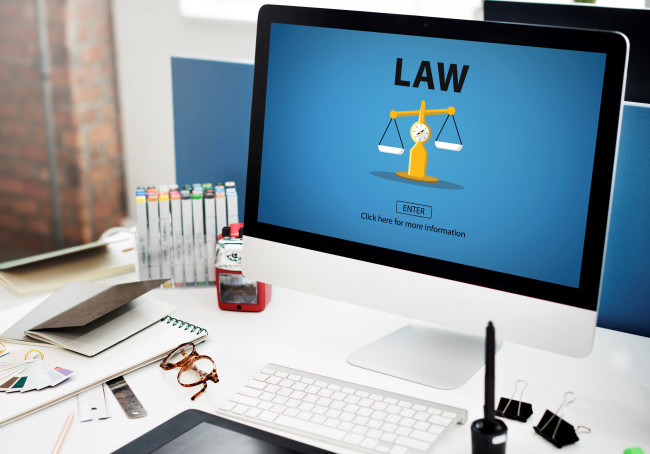 A laptop screen on a brandless law firm’s website