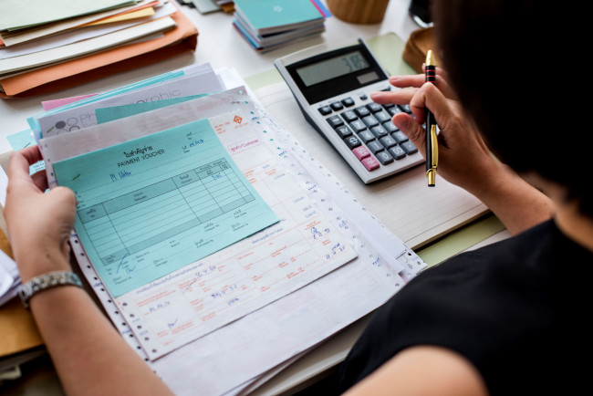An accountant computes business operational expenses