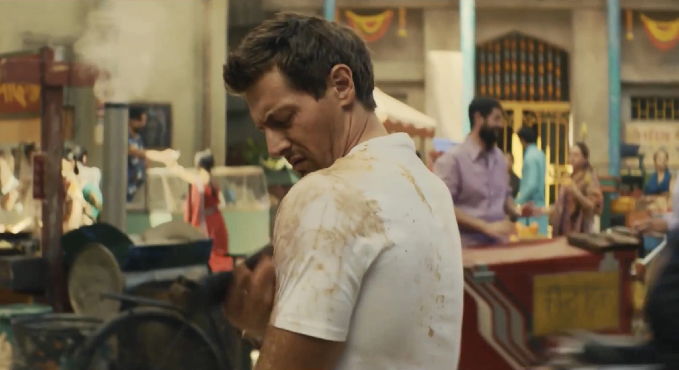 The action hero in "Stain Protocol" upset about his dirty shirt