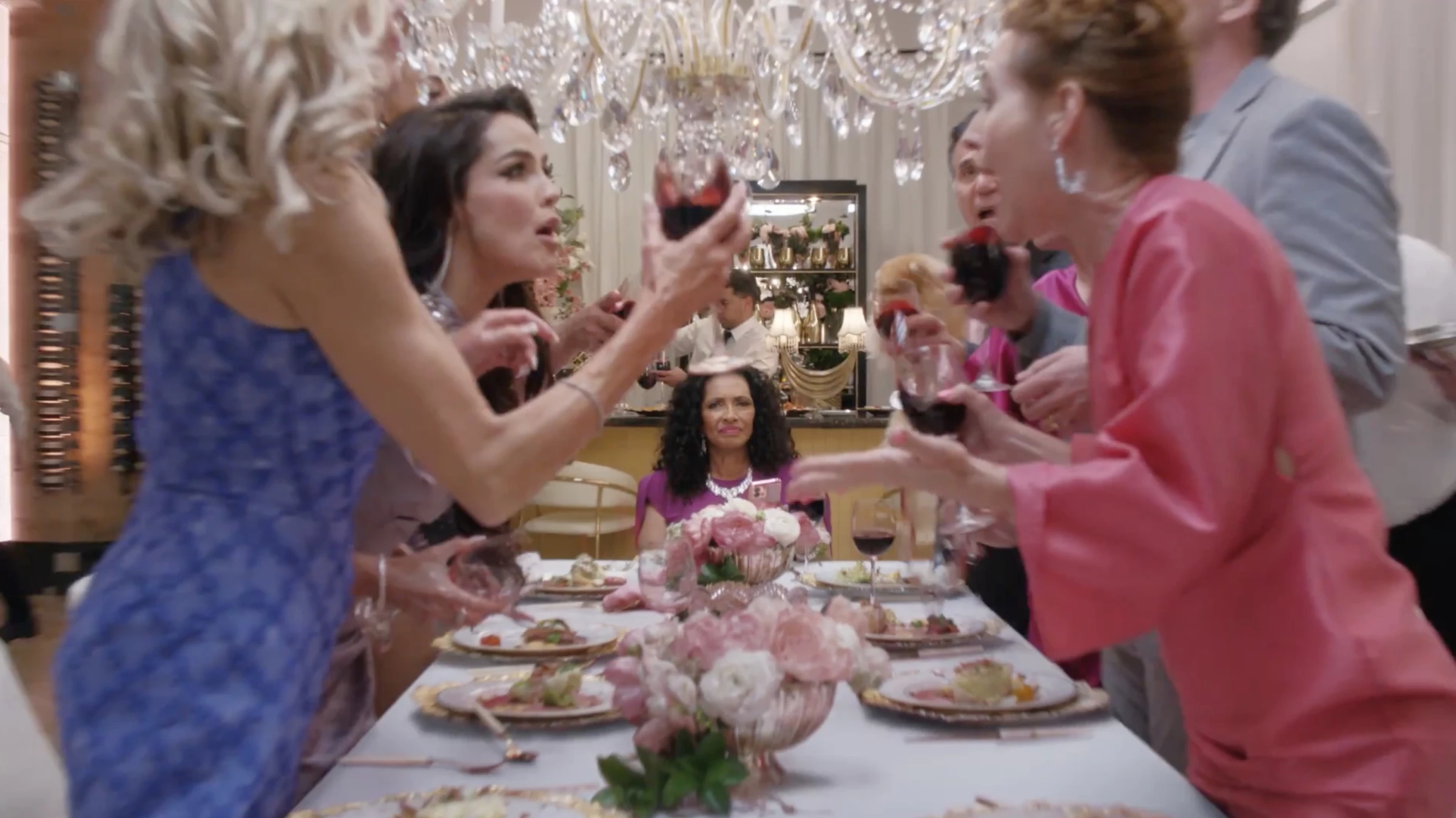 Housewives in a messy brawl as the host holds her phone to order from Amazon