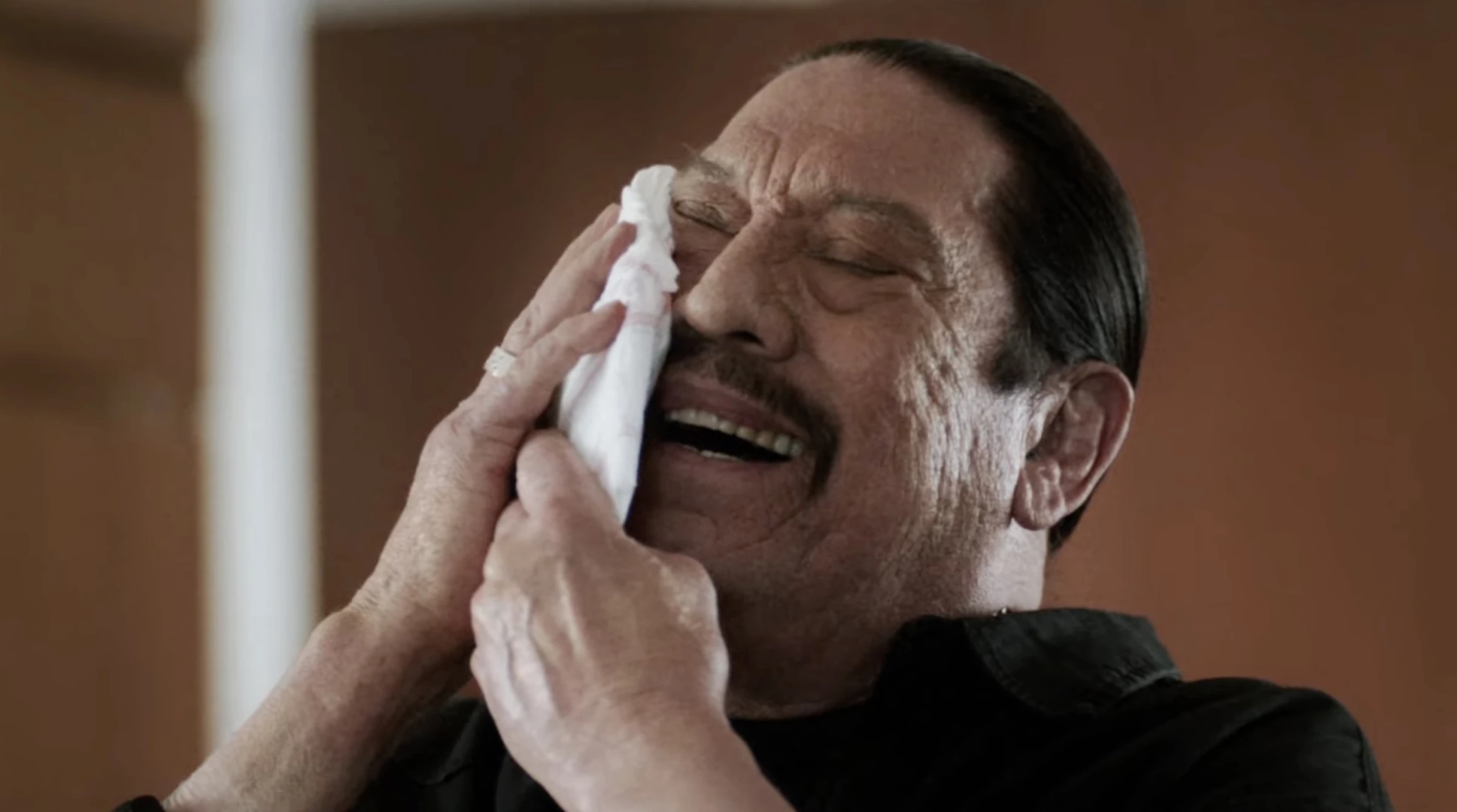 Danny couldn't resist rubbing the diaper against his face.