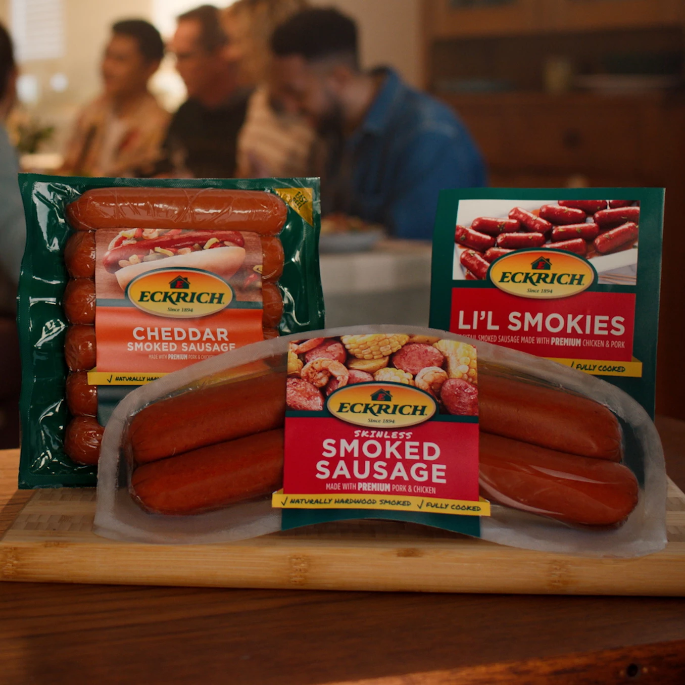 Eckrich's sausage products with a family enjoying a meal in the background
