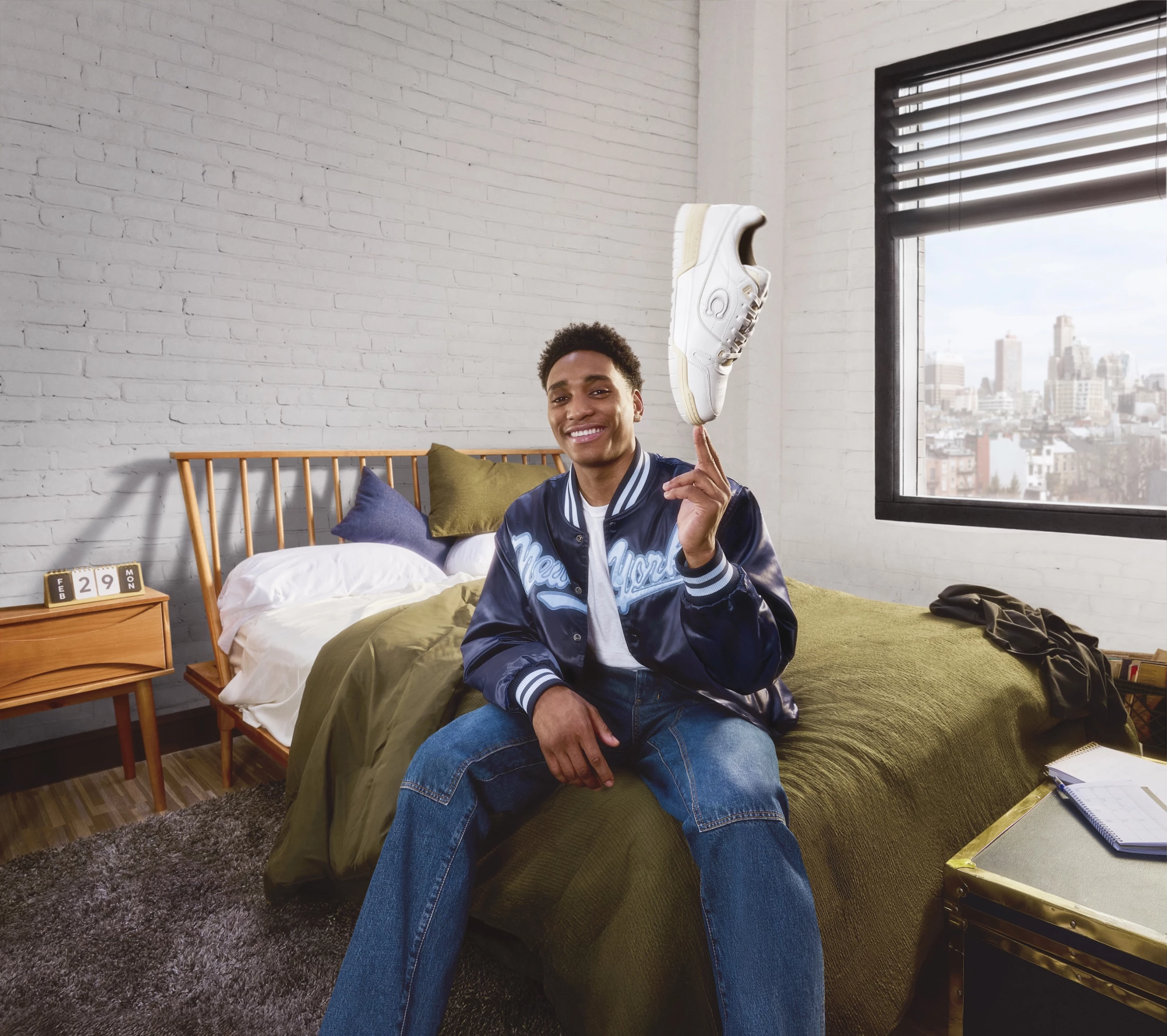 Tahaad Pettiford spinning the sneaker like a basketball