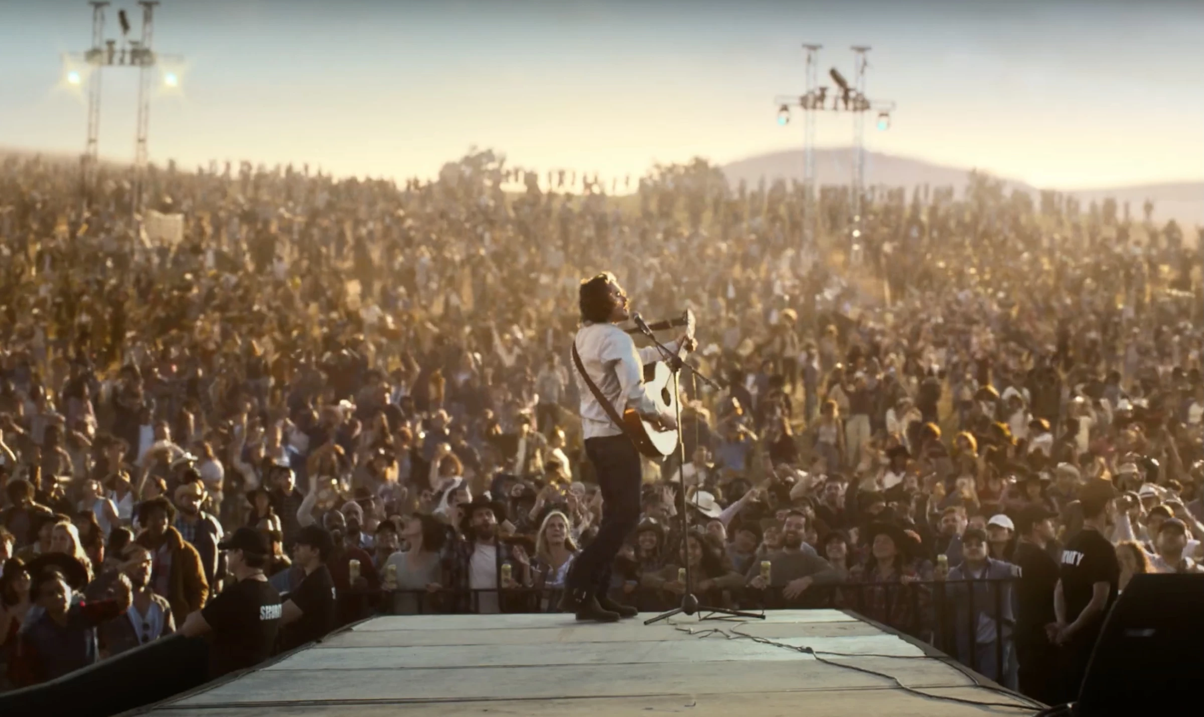 The man's dreams come true, performing for a huge crowd.