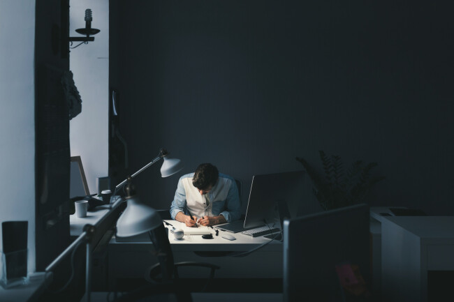 Man working alone at desk
