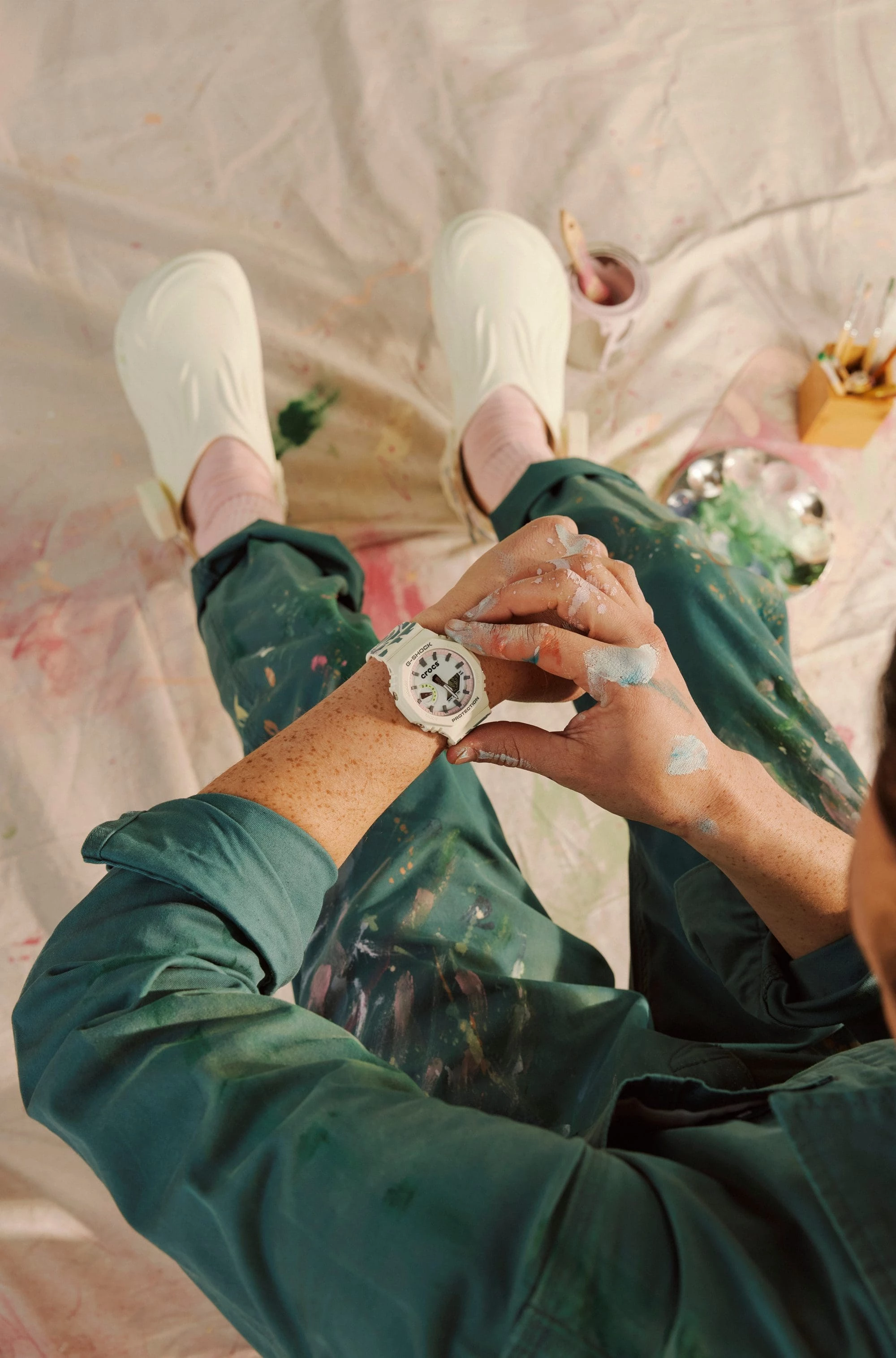 The G-SHOCK x Crocs watch shown worn on the wrist