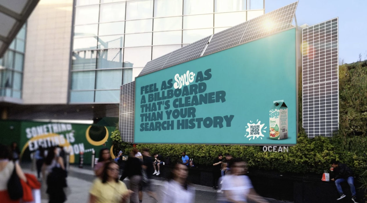 SMUG Dairy billboard ad displayed on the side of a building in the UK, part of the brand’s hyper-local OOH campaign created by BMB.