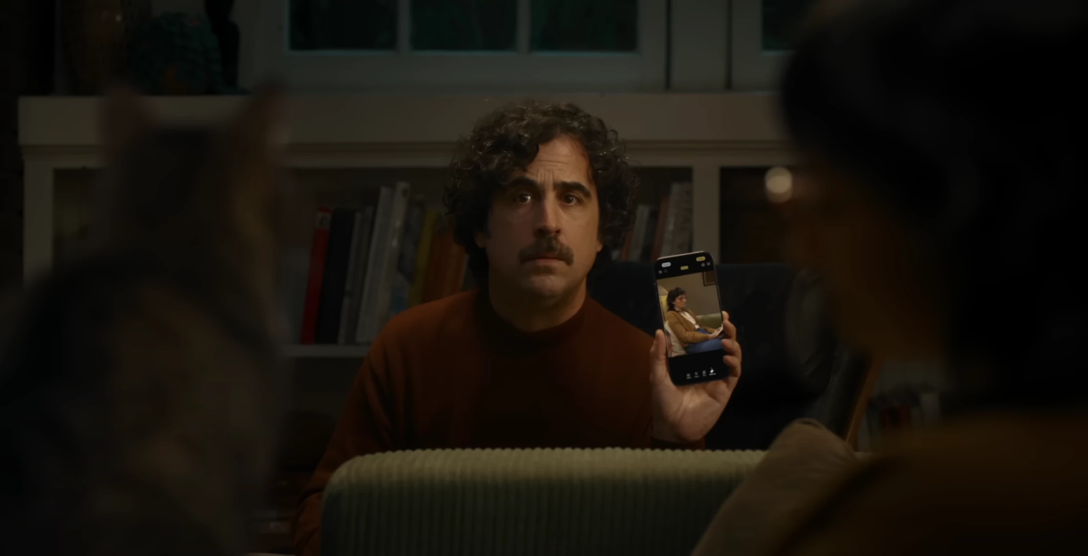 The man removes Garrett from the frame using Clean Up | Source: Apple
