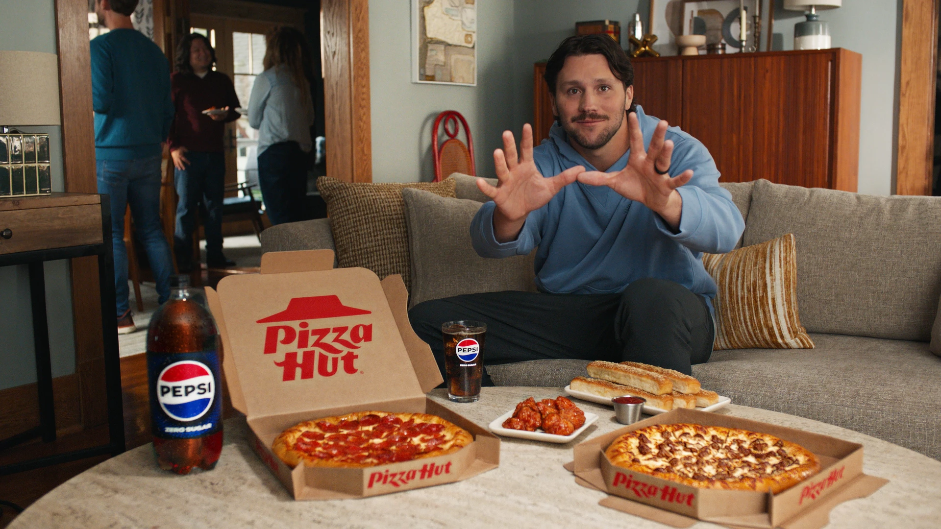 Josh Allen gesturing football commands in the Pizza Hut spot | Source: Pizza Hut