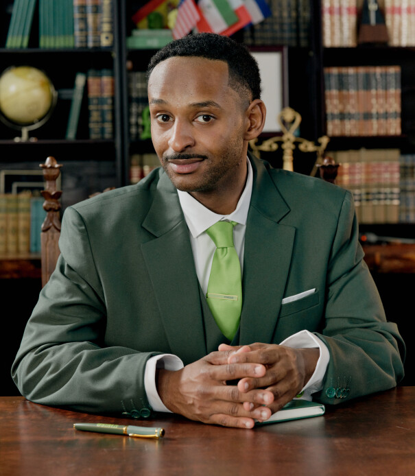 Mohammed as 'Don T. Overpay' Mohammed as Wise's main character, 'Don T. Overpay'