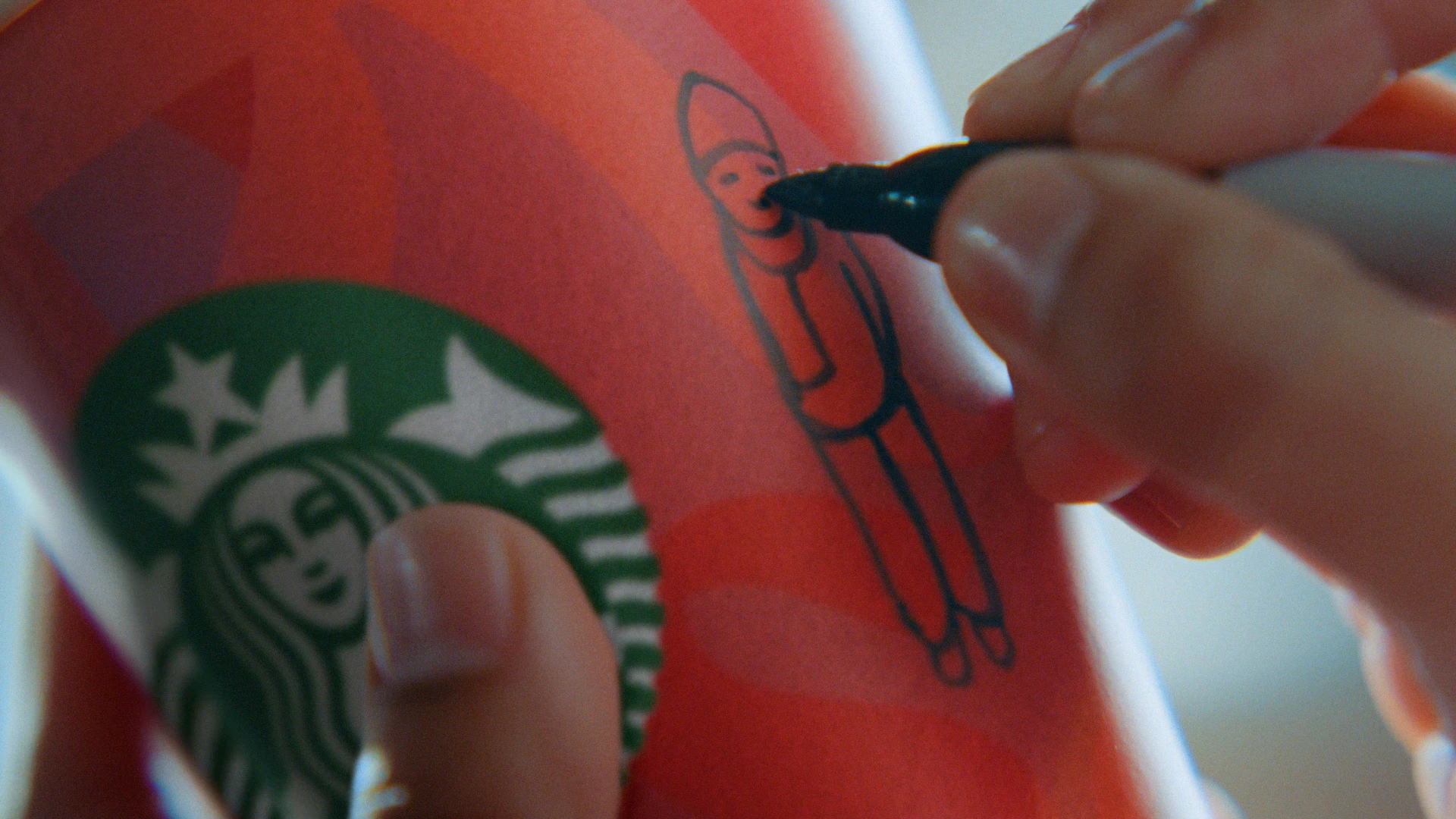 A hand drawing on Starbucks' holiday cups
