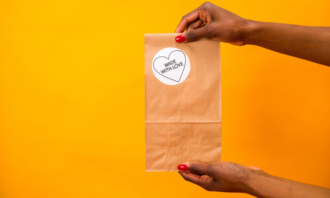 A Person Holding a Paper Bag