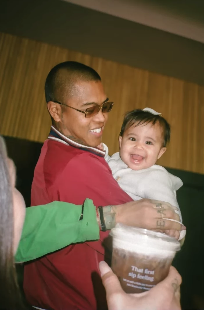 A father carrying his baby in Starbucks at "Together" | Source: Starbucks A father carrying his baby in Starbucks at "Together" | Source: Starbucks