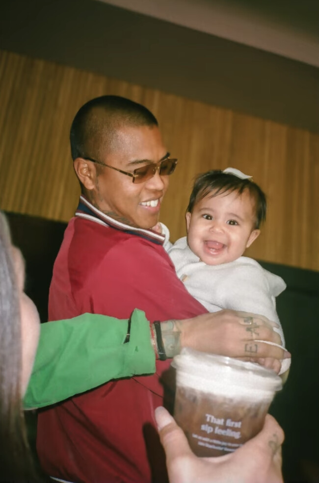 A father carrying his baby in Starbucks at "Together" | Source: Starbucks A father carrying his baby in Starbucks at "Together" | Source: Starbucks