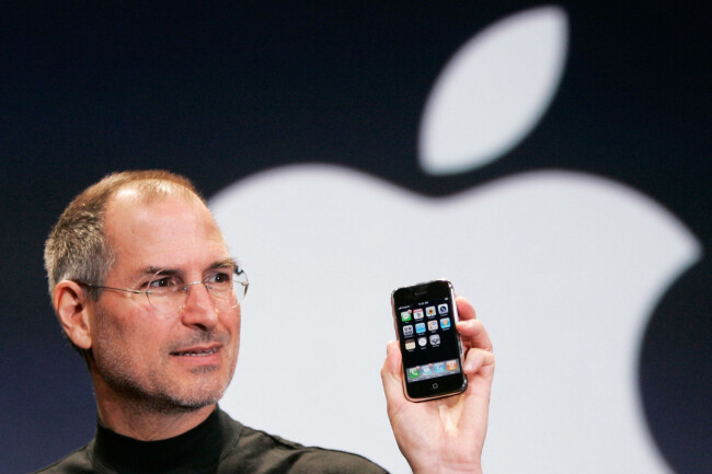 Steve Jobs unveiling the first iPhone after rebranding Apple.